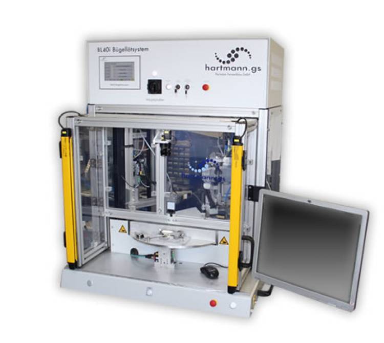  Doppelbügellötsystem mit einem dreifach geteilten Drehteller.